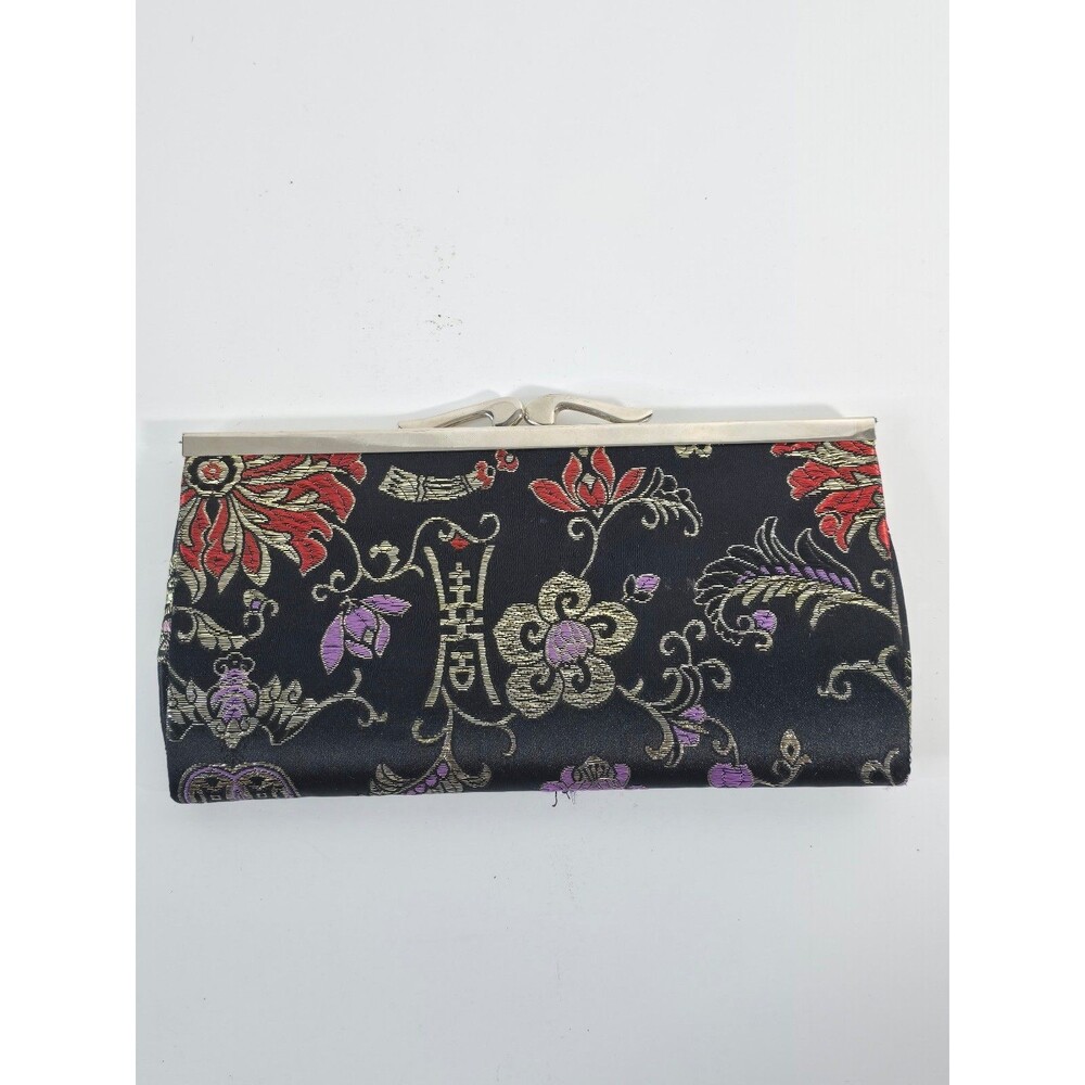 Black floral brocade kiss-lock clutch features a vibrant Asian-inspired